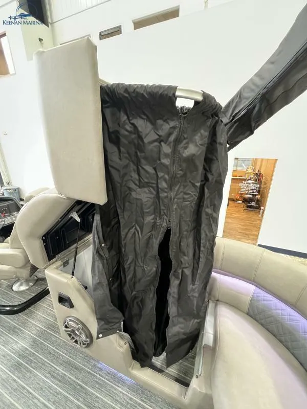 Slide: The Image of 2023 Premier 250 Intrigue RF boat interior with protective cover displayed. - 17