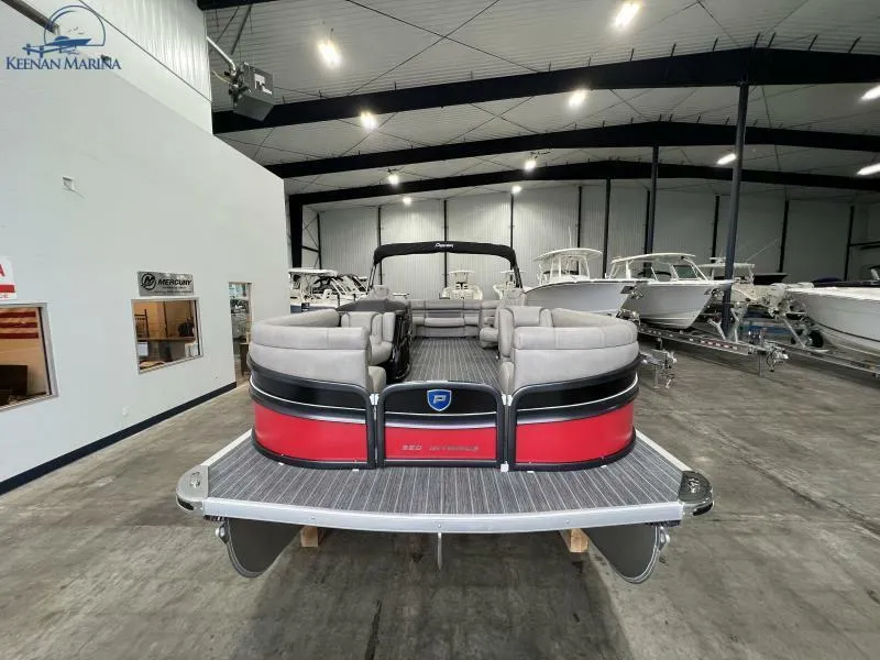 Slide: The Image of 2023 Premier 250 Intrigue RF pontoon boat in showroom, rear view. - 8