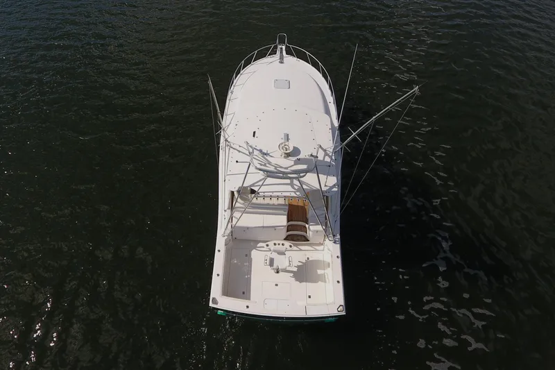 Slide: The Image of Aerial view of 2008 Cabo 40 boat on calm water. - 13