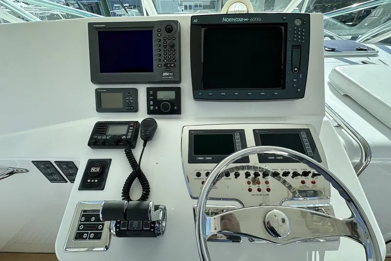 Slide: The Image of Control panel of a 2008 Cabo 40 boat with navigation and communication equipment. - 29