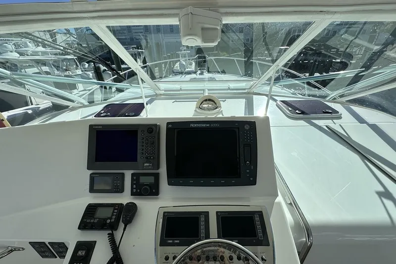 Slide: The Image of Helm of 2008 Cabo 40 boat with navigation equipment and controls. - 31