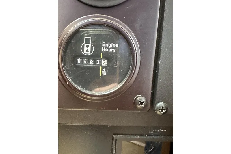 Slide: The Image of Engine hour meter showing 463.2 hours on a 2008 Cabo 40 model. - 76
