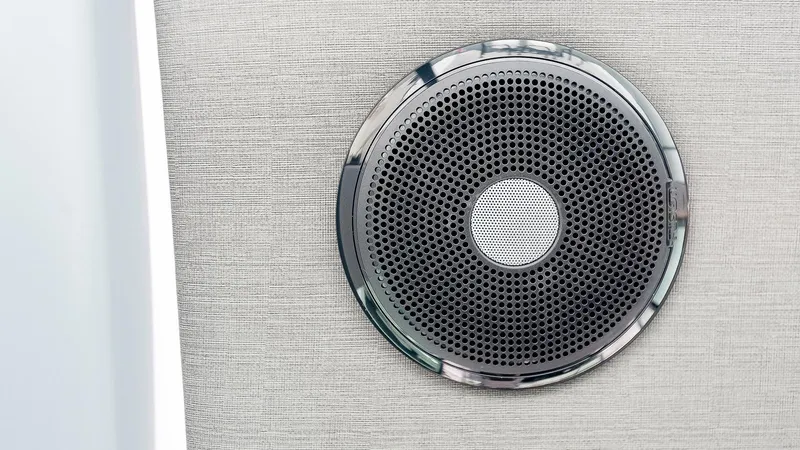 Slide: The Image of Close-up of a speaker on the 2023 Axopar 37 XC Cross Cabin Wet Bar. - 25