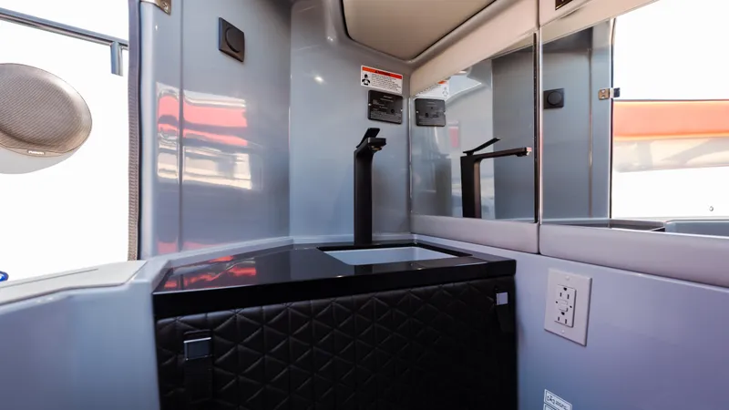 Slide: The Image of Interior of 2023 BRABUS Shadow 500 T-Top, featuring sleek design and modern amenities. - 23