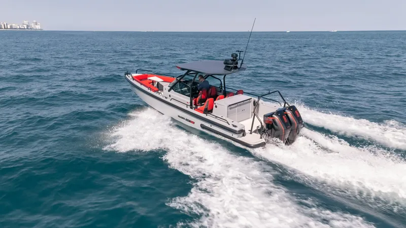 Slide: The Image of 2023 BRABUS Shadow 500 T-Top cruising on open sea, showcasing sleek design and powerful engines. - 3