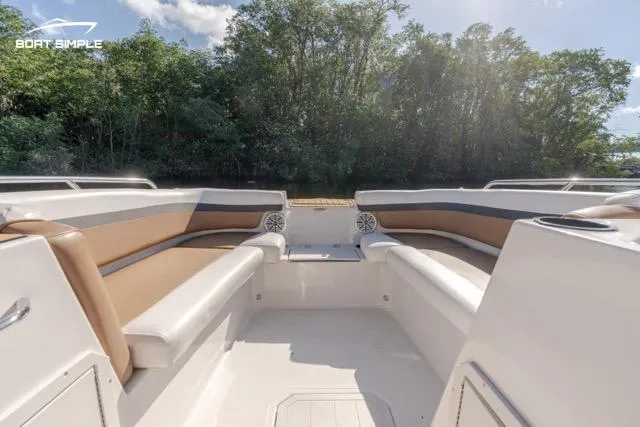 Slide: The Image of 2022 Starcraft SVX 191 OB boat interior with spacious seating and scenic background. - 7