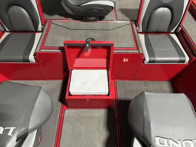 Slide: The Image of Interior of 2025 Lund 1875 Renegade SS boat with red and gray seating. - 11