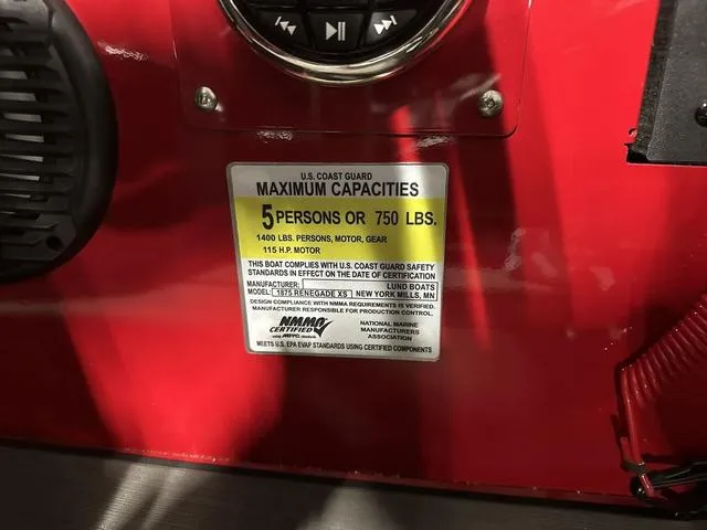 Slide: The Image of 2025 Lund 1875 Renegade SS boat capacity label, red background, U.S. Coast Guard standards. - 17