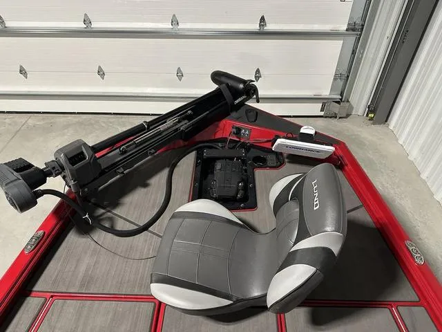 Slide: The Image of 2025 Lund 1875 Renegade SS boat interior with gray seat and trolling motor. - 22