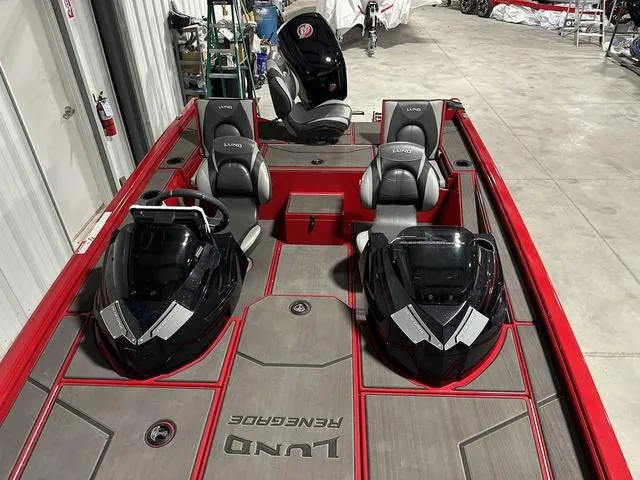 Slide: The Image of 2025 Lund 1875 Renegade SS boat interior with dual consoles and seating. - 25
