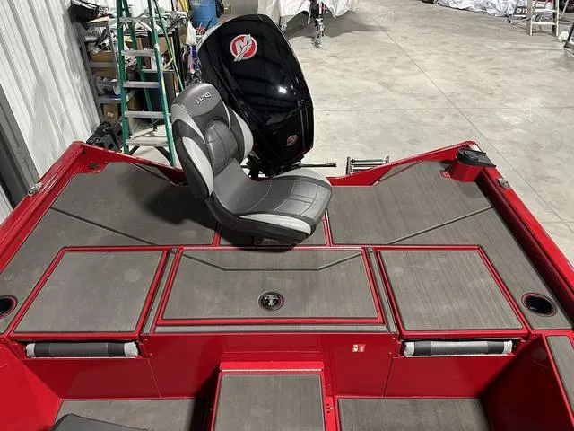 Slide: The Image of 2025 Lund 1875 Renegade SS boat interior with red and gray seating. - 8