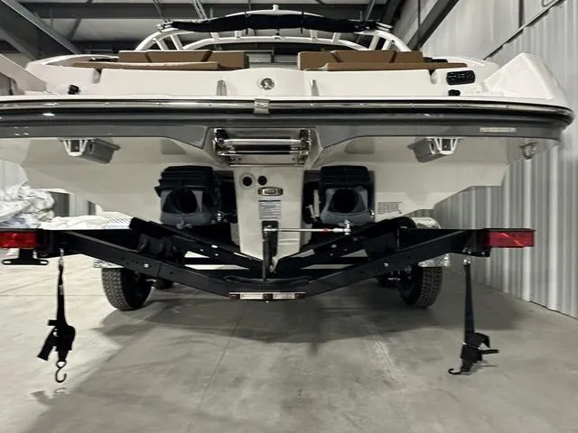 Slide: The Image of 2025 Yamaha Boats 222SD on trailer in storage facility. - 6
