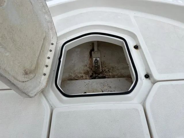 Slide: The Image of Open storage compartment on 2021 Bayliner T18BAY boat deck. - 22