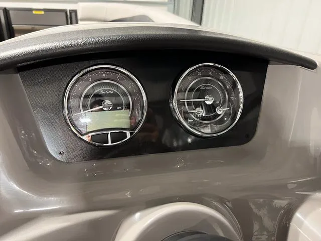 Slide: The Image of Dashboard of 2025 Barletta Aria A24QC boat with dual gauges. - 15