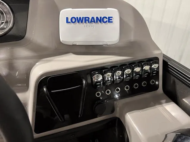 Slide: The Image of Control panel of 2025 Barletta Aria A24QC boat with Lowrance Hook display. - 16