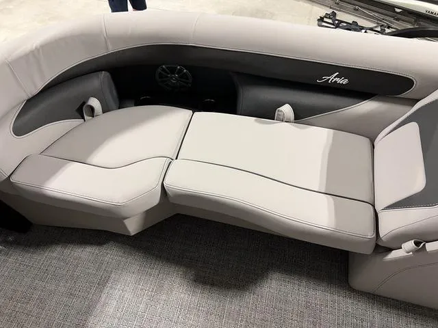 Slide: The Image of 2025 Barletta Aria A24QC boat interior with luxurious seating and modern design. - 8