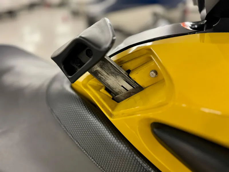 Slide: The Image of Close-up of 2014 Yamaha WaveRunner FZS seat latch mechanism. - 12