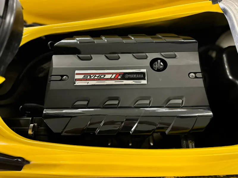 Slide: The Image of 2014 Yamaha WaveRunner FZS SVHO engine close-up in yellow watercraft. - 13