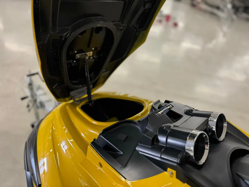 Slide: The Image of 2014 Yamaha WaveRunner FZS with open storage compartment, yellow exterior. - 8