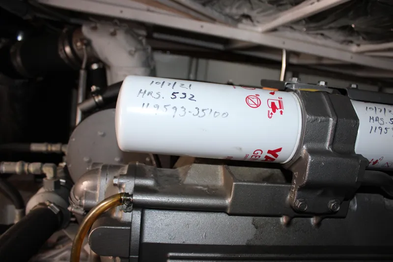 Slide: The Image of Engine component of a 2006 Silverton 42 Convertible, featuring a labeled filter. - 25