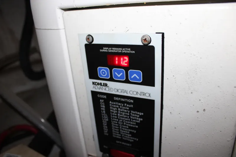 Slide: The Image of Kohler advanced digital control panel on 2006 Silverton 42 Convertible boat. - 27