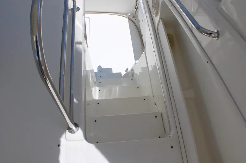 Slide: The Image of Staircase on 2006 Silverton 42 Convertible yacht with stainless steel handrails. - 40