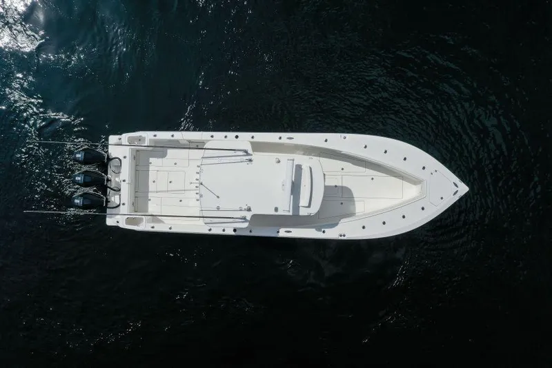 Slide: The Image of Aerial view of 2021 SeaVee 370z boat on dark water. - 4