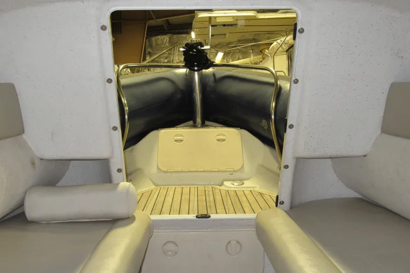 Slide: The Image of Interior view of 2007 Protector Targa 28 boat with seating and storage area. - 6