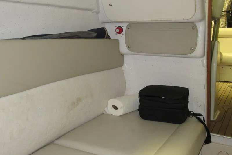 Slide: The Image of Interior of a 2007 Protector Targa 28 boat with seating and storage. - 7