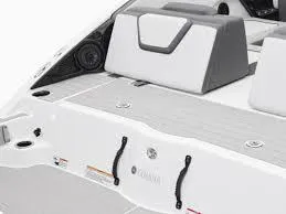 Slide: The Image of 2025 Yamaha Boats AR250 interior seating and deck area. - 11