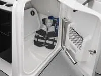 Slide: The Image of Yamaha AR250 2025 boat storage compartment with life jackets and netted pocket. - 4