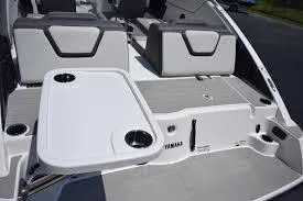 Slide: The Image of 2025 Yamaha Boats AR250 interior with seating and table setup. - 9