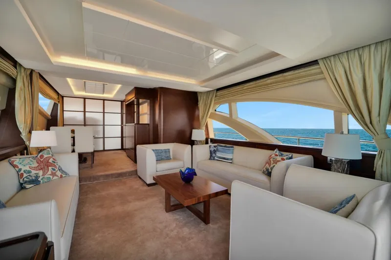 Slide: The Image of Luxurious interior of 2009 Azimut 75 yacht with elegant seating and ocean view. - 13