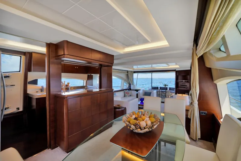 Slide: The Image of Luxurious interior of 2009 Azimut 75 yacht with elegant dining area and sea view. - 17
