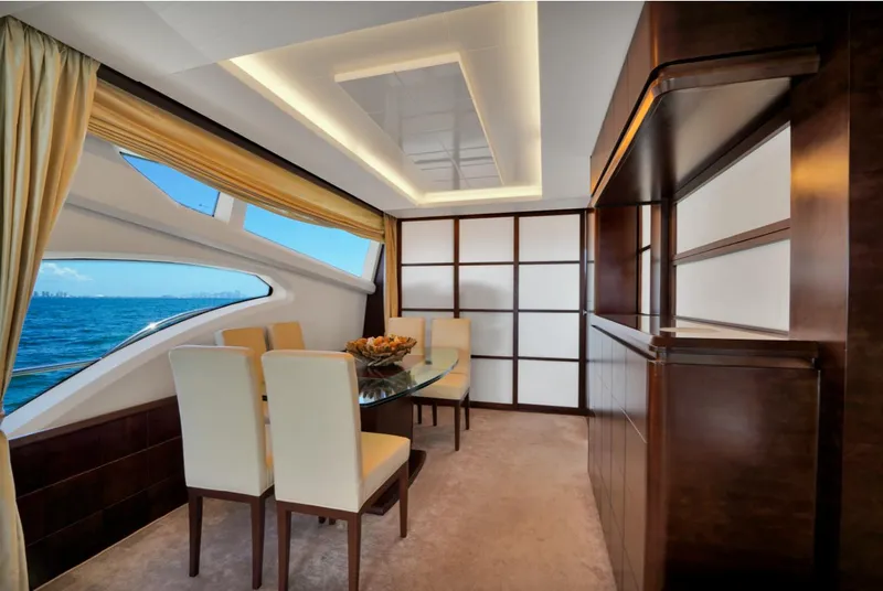 Slide: The Image of Luxurious interior of 2009 Azimut 75 yacht with elegant dining area and ocean view. - 18
