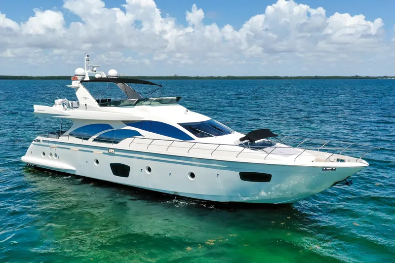 Slide: The Image of Luxury 2009 Azimut 75 yacht cruising on clear blue waters under a sunny sky. - 2