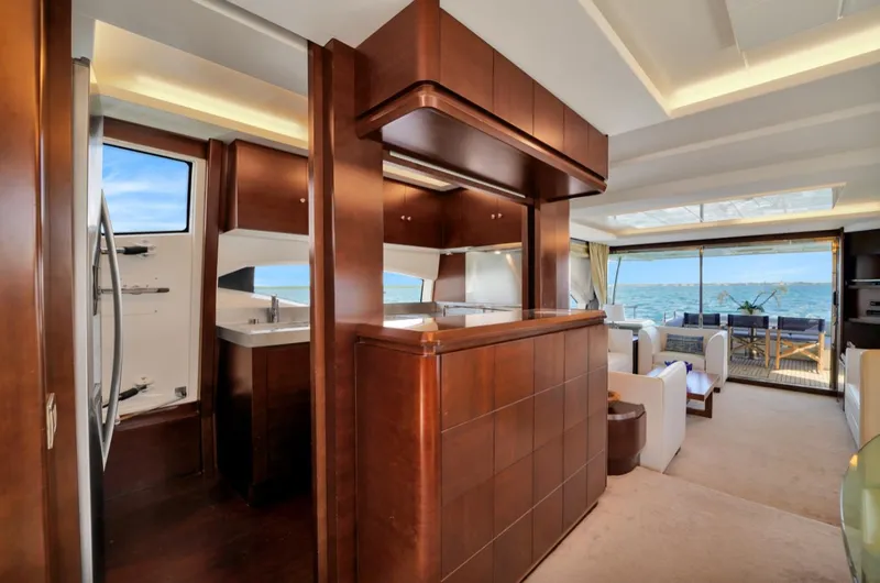 Slide: The Image of Luxurious interior of 2009 Azimut 75 yacht with modern wood finishes and ocean view. - 20