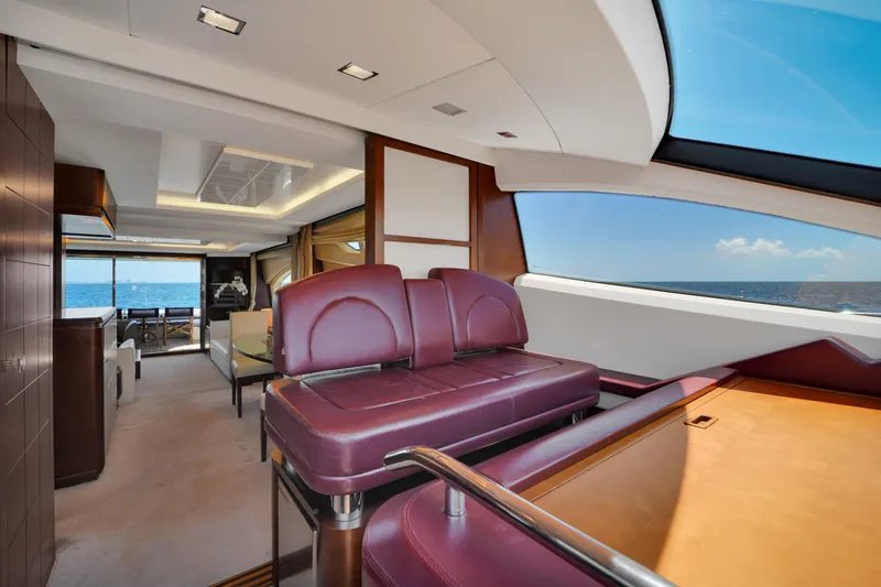 Slide: The Image of Luxurious interior of a 2009 Azimut 75 yacht with leather seating and ocean view. - 25