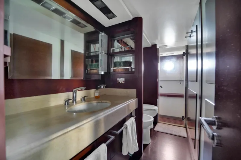 Slide: The Image of Luxurious bathroom in 2009 Azimut 75 yacht with modern fixtures and elegant design. - 32