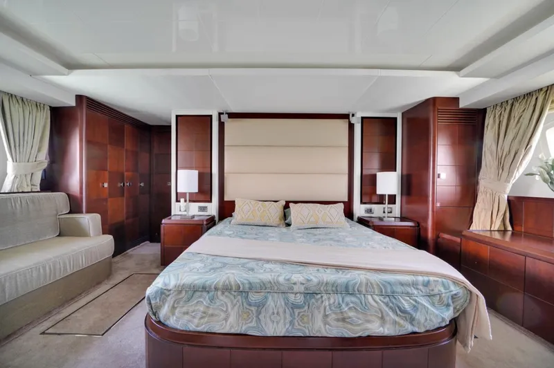 Slide: The Image of Luxurious bedroom interior of 2009 Azimut 75 yacht with elegant wood finishes. - 33