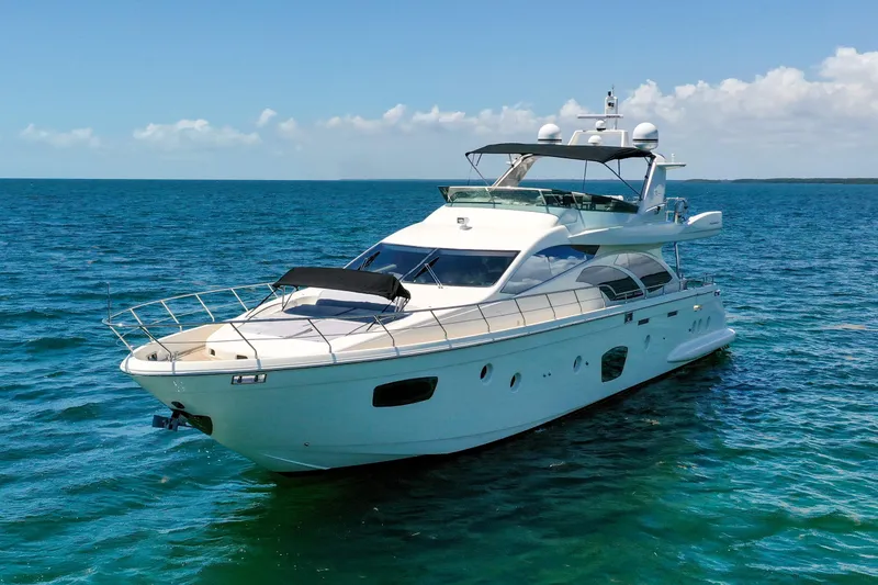 Slide: The Image of Azimut 75 yacht from 2009 cruising on clear blue ocean waters. - 4