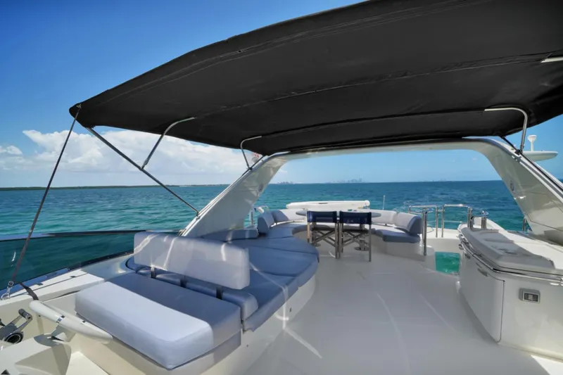 Slide: The Image of Luxurious 2009 Azimut 75 yacht deck with seating, ocean view, and canopy. - 47