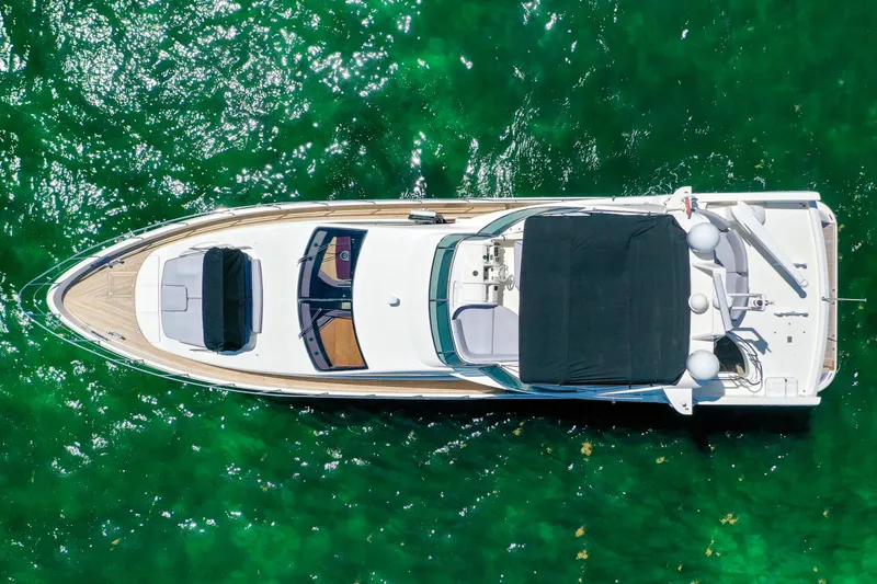 Slide: The Image of Aerial view of 2009 Azimut 75 yacht on vibrant green water. - 6
