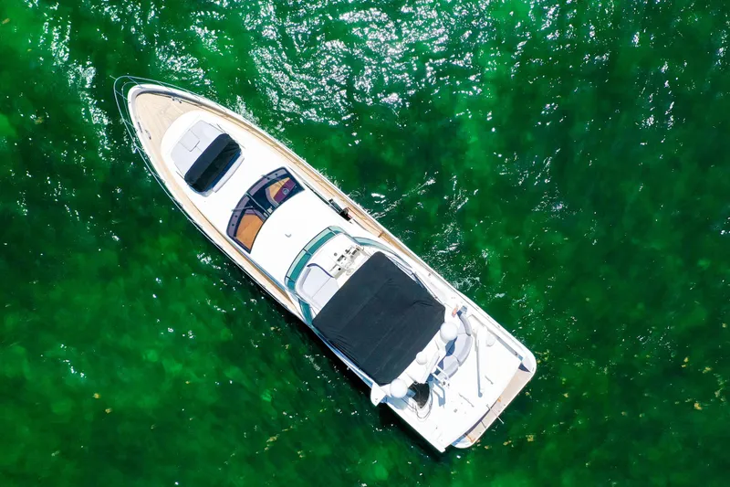 Slide: The Image of Aerial view of 2009 Azimut 75 yacht on vibrant green water. - 8