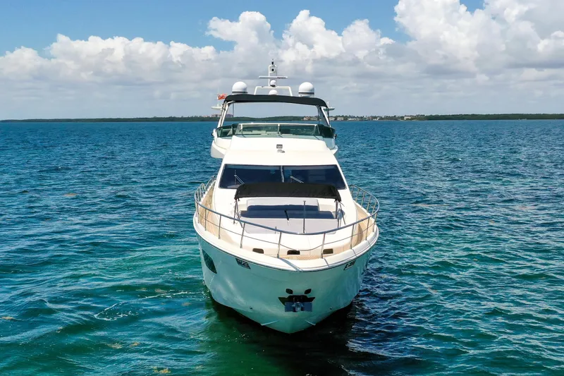 Slide: The Image of Azimut 75 yacht from 2009 on open water under a clear sky. - 9