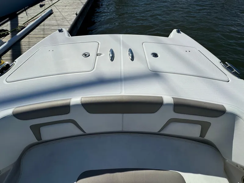 Slide: The Image of 2020 World Cat 280 DC x boat deck, docked by the water. - 10