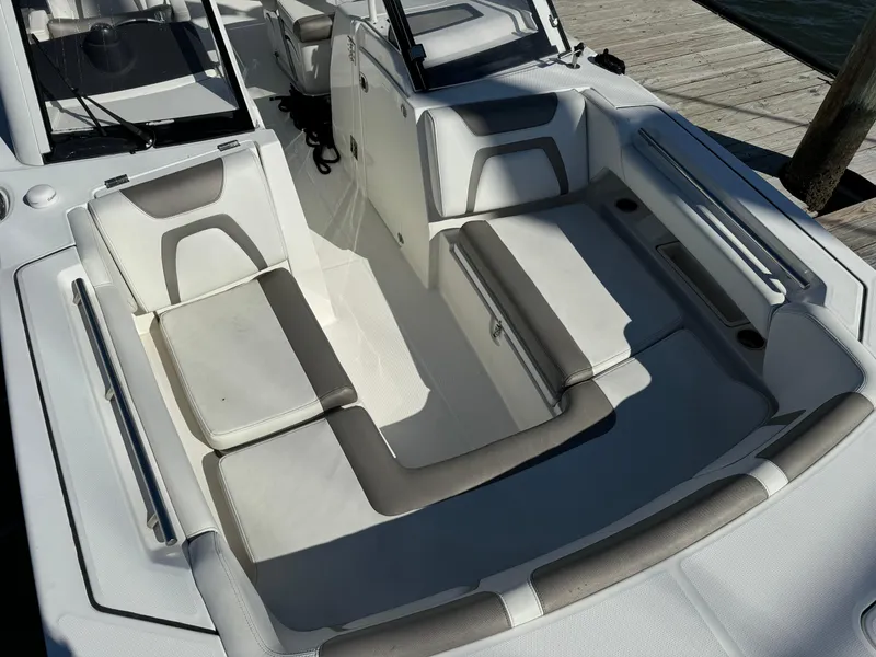 Slide: The Image of 2020 World Cat 280 DC x boat interior with cushioned seating and sleek design. - 13