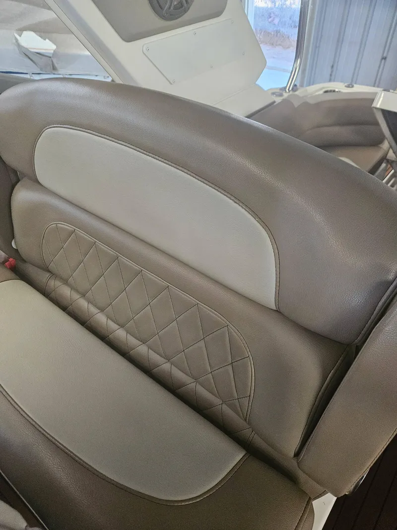Slide: The Image of Luxurious leather seating in 2009 Monterey 260SCR boat interior. - 16