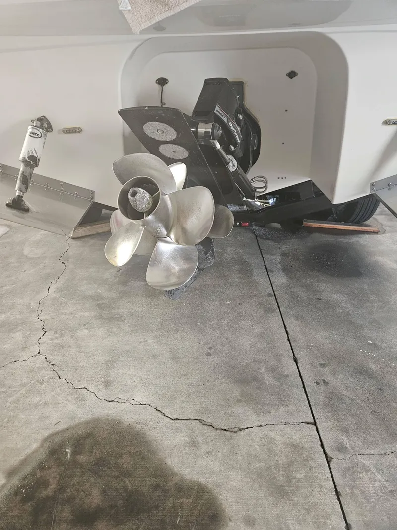 Slide: The Image of 2009 Monterey 260SCR boat propeller on concrete floor, showcasing marine engineering. - 21