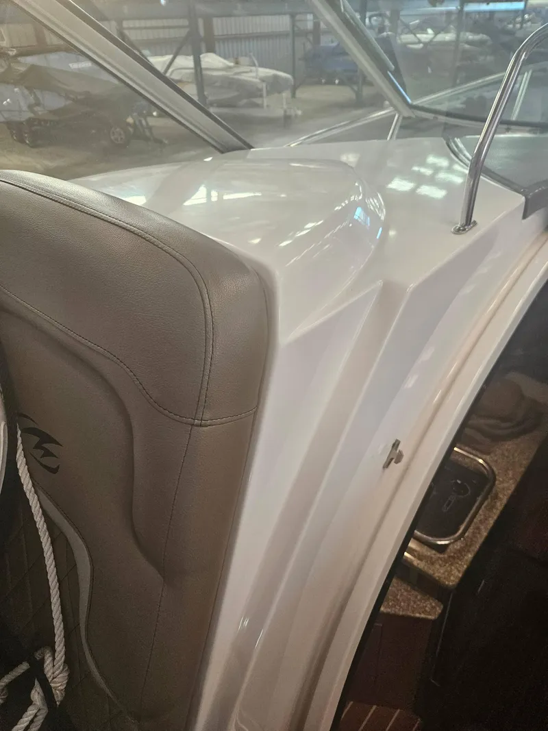 Slide: The Image of Interior view of 2009 Monterey 260SCR boat, featuring sleek design and comfortable seating. - 6